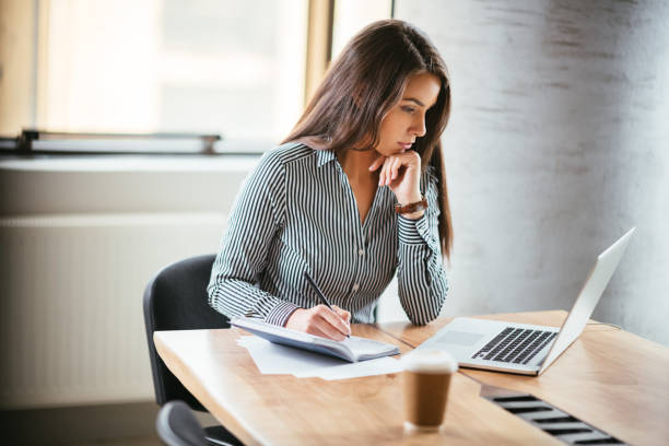 istock Beautiful business woman at work 1182616283