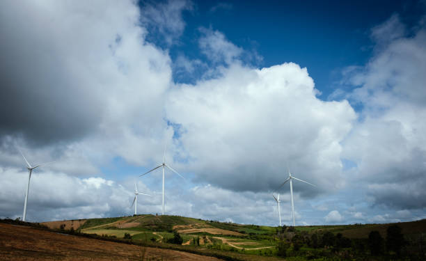 istock Wind turbines generating electricity with blue sky. 1182616527