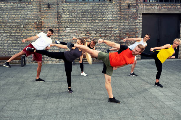 istock Group of athletes working out 1182617764