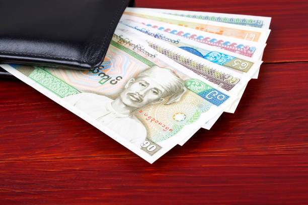 istock Burmese money in the black wallet 1182624079