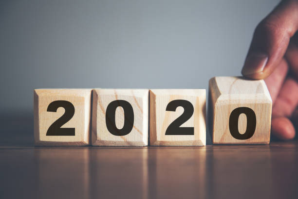 istock 2020 text on wooden cubes on desk 1182624105