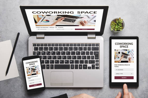 istock Coworking space concept on laptop, tablet and smartphone screen 1182625346