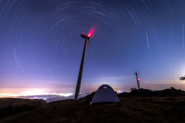 istock Wind Turbines at Midnight Star Field 1182628723