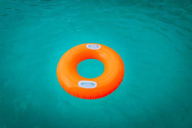 istock kids floatie in the pool, water safety 1182628966