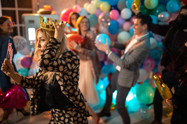 istock Young people celebrating New Year in good mood 1182629037
