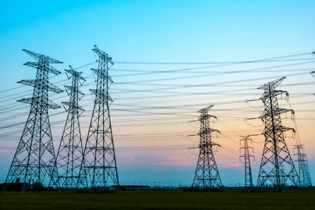istock Electricity tower silhouette and sky landscape at dusk 1182629868