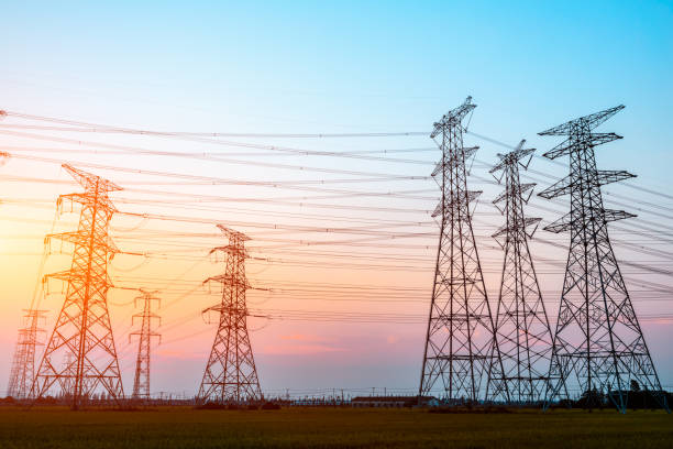 istock Electricity tower silhouette and sky landscape at dusk 1182629869