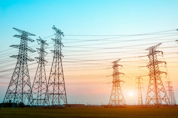 istock Electricity tower silhouette and sky landscape at dusk 1182629899