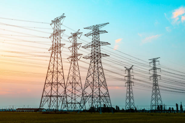 istock Electricity tower silhouette and sky landscape at dusk 1182629909