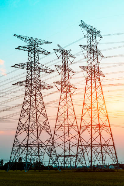 istock Electricity tower silhouette and sky landscape at dusk 1182629914