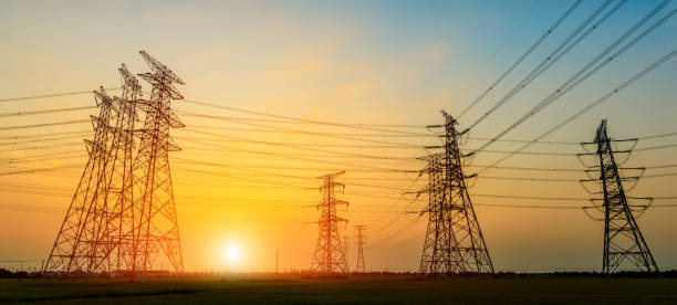 istock Electricity tower silhouette and sky landscape at dusk 1182629921