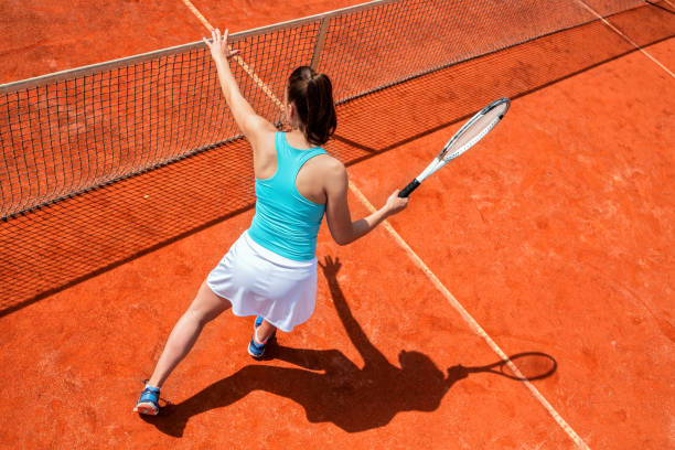 istock Female tennis player on the net 1182630169