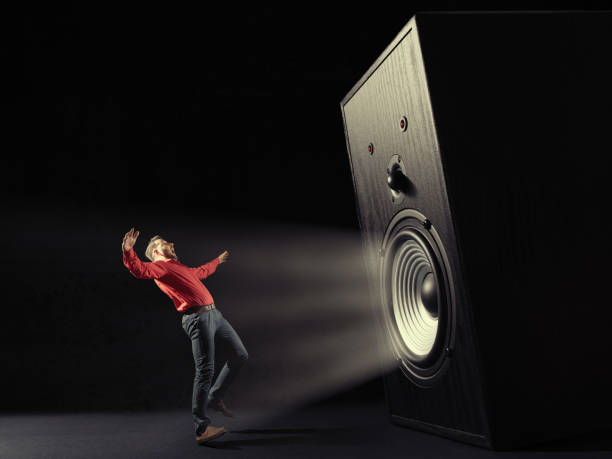 istock Powerful sound wave with funny sound speaker and screaming man. 1182631643