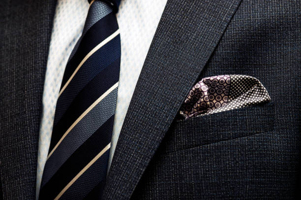 Business suit details, tie, jacket and handkerchief Business suit details, tie, jacket and handkerchief handkerchief photos stock pictures, royalty-free photos & images