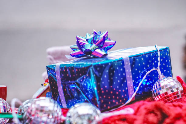 istock Blue gift box on the table for christmas party 1182632149