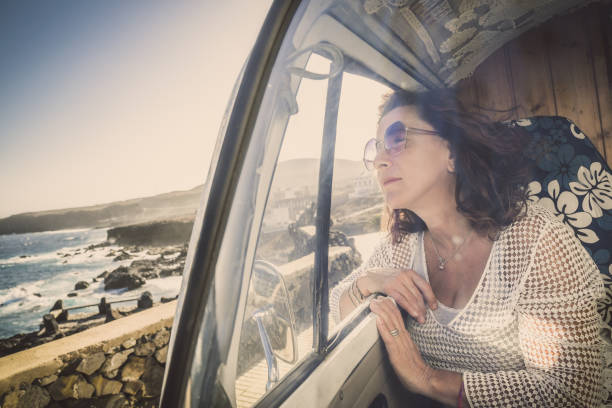 istock Woman Sitting In Car 1182634029