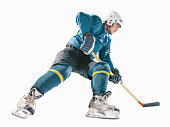 Ice hockey player isolated on white background