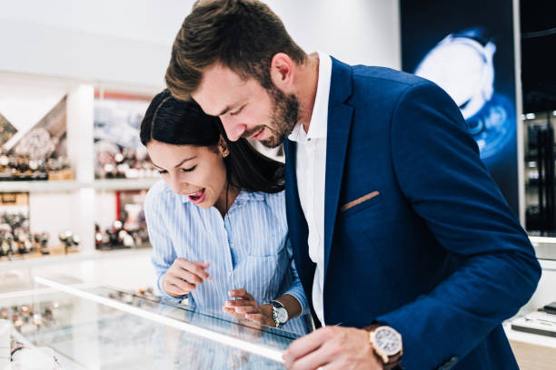 istock Middle age couple in jewelry store 1182638888