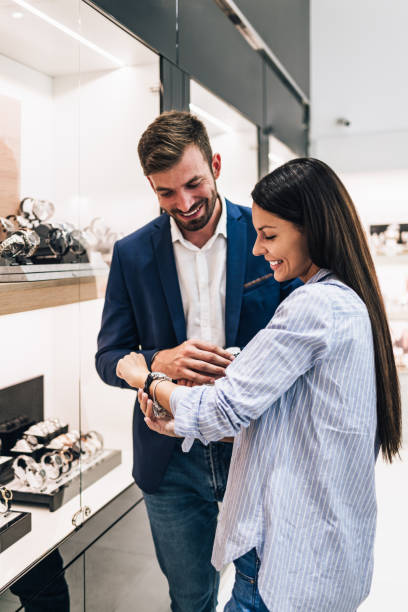 istock Middle age couple in jewelry store 1182639187