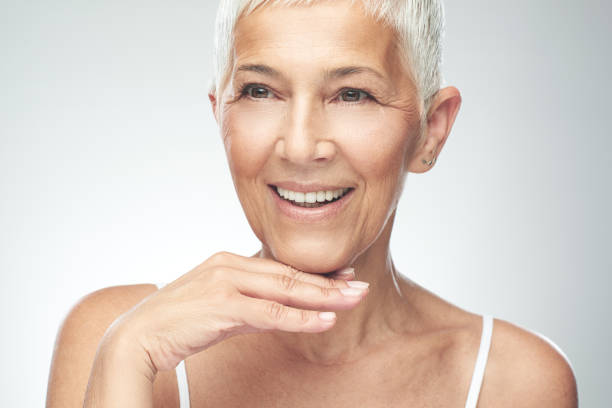 istock Senior woman posing in studio. 1182642249