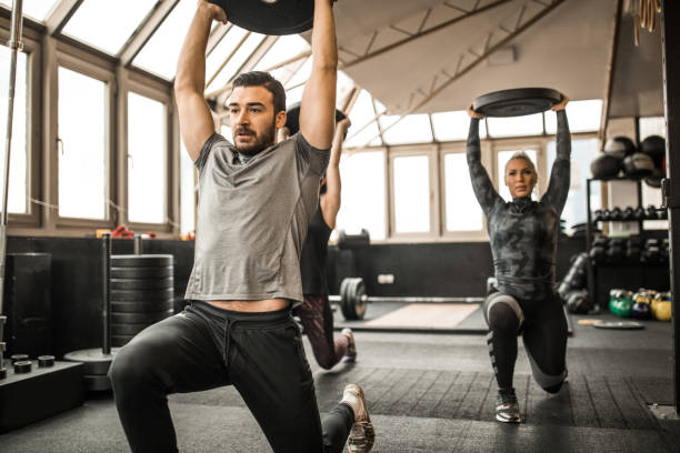 istock Lunge training with fitness trainer 1182644377