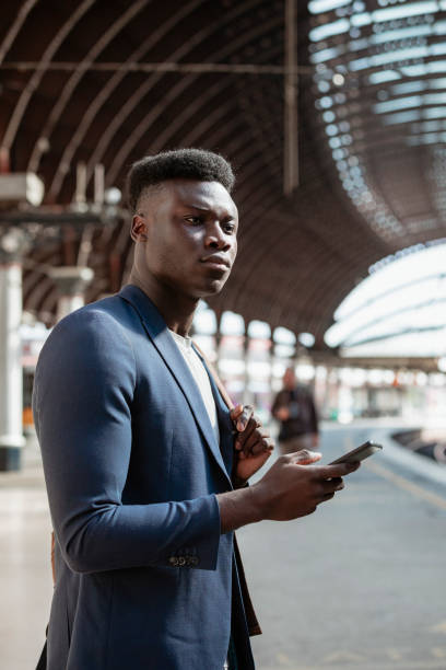 istock Businessman Waiting for a Train 1182645982