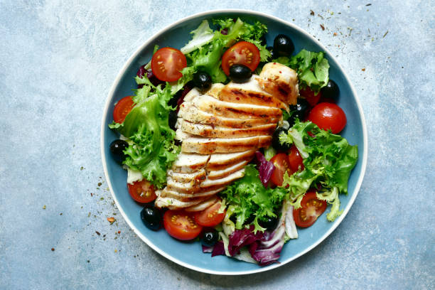 istock Grilled chicken breast with vegetable salad 1182646543