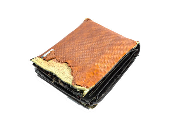 Vintage or Old wallet brown torn isolated on white background