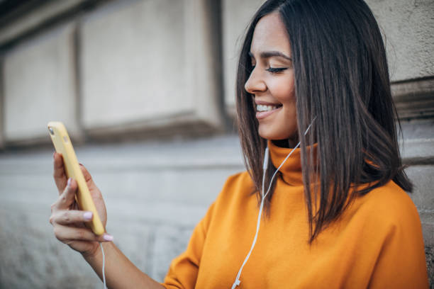 istock Modern woman using phone 1182649466