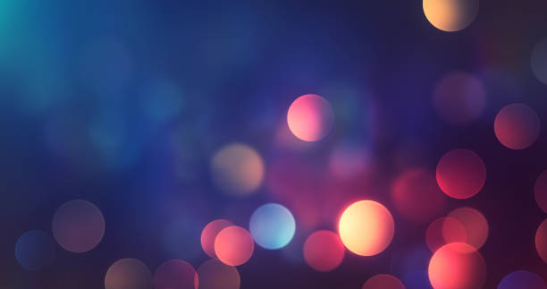 abstrakte multi farbige bokeh hintergrund - lichter bei nacht - herbst, herbst, winter, weihnachten - unscharf gestellt stock-fotos und bilder