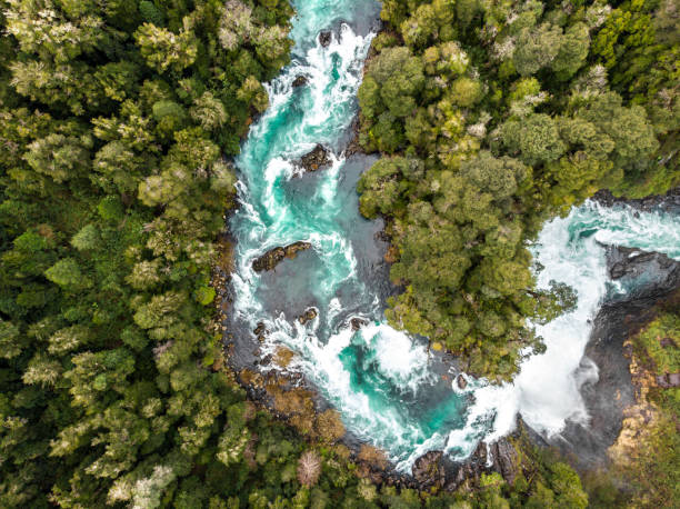 Aerial view of Huilo Huilo river in southern Chile Aerial view of Huilo Huilo river near to Saltos del Petrohue in southern Chile stream flow stock pictures, royalty-free photos & images