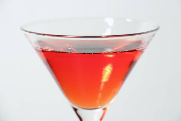 Close up shot of colorful Martini cocktails against the white background.