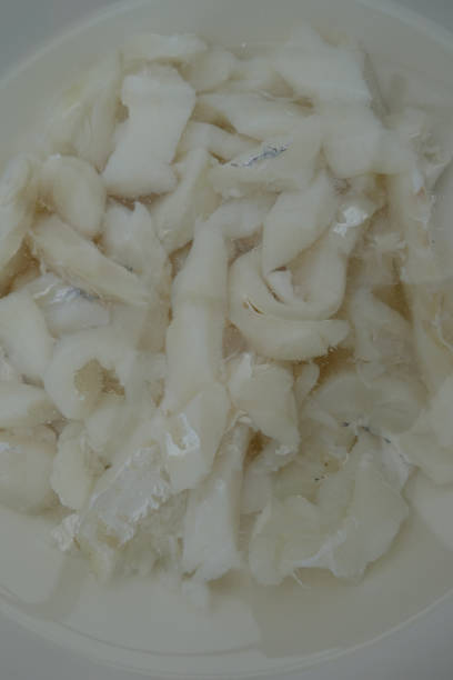 istock Dry cod being desalinated in cold water  Portion food 1182651913