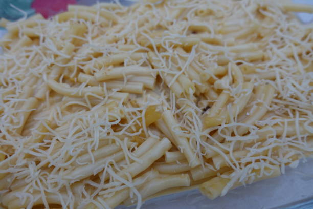 istock Preparation of a cheese macaroni gratin 1182652066