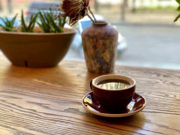 istock black coffee in a cup in a coffee shop 1182652395