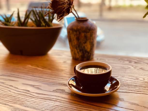 istock black coffee in a cup in a coffee shop 1182652410