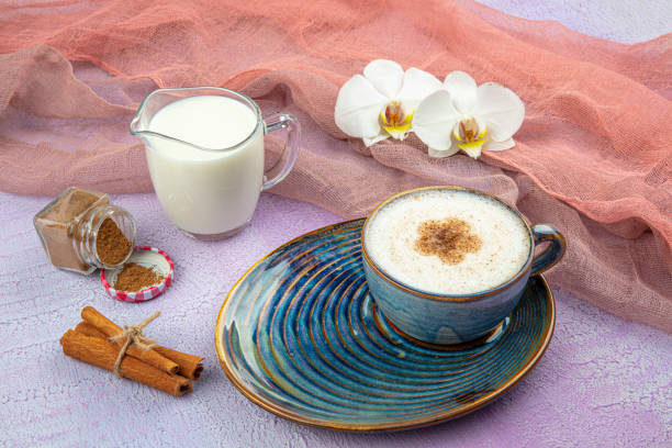 istock Turkish Salep or Sahlep with cinnamon sticks / Christmas Eggnog. Served with cinnamon sticks and orchid flower. 1182656477