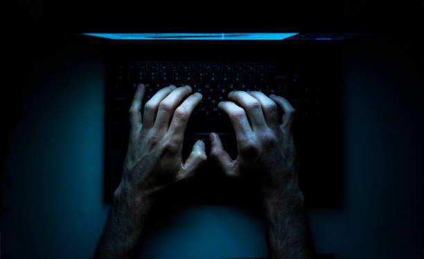 Top view of the hands of a programmer on  his laptop Top view of the hands of a programmer on  his laptop. computer hacker stock pictures, royalty-free photos & images
