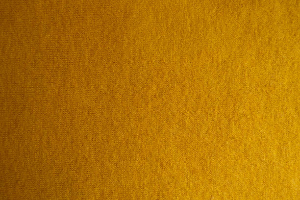 istock Top view of amber yellow woolen fabric 1182661042