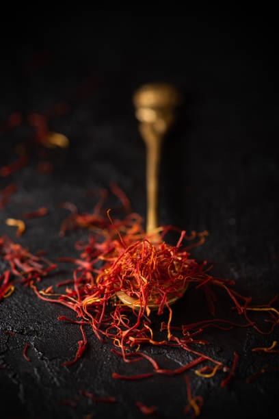 istock Saffron spices threads in vintage brass spoon 1182662214