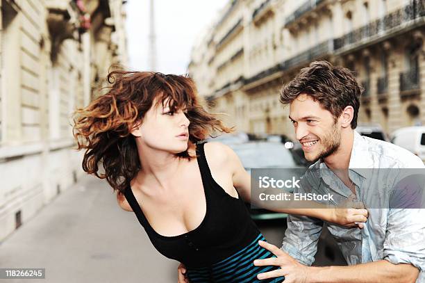 Lovers Quarrelling In Paris France Stock Photo - Download Image Now - Sexual Harassment, Street, Sexual Assault