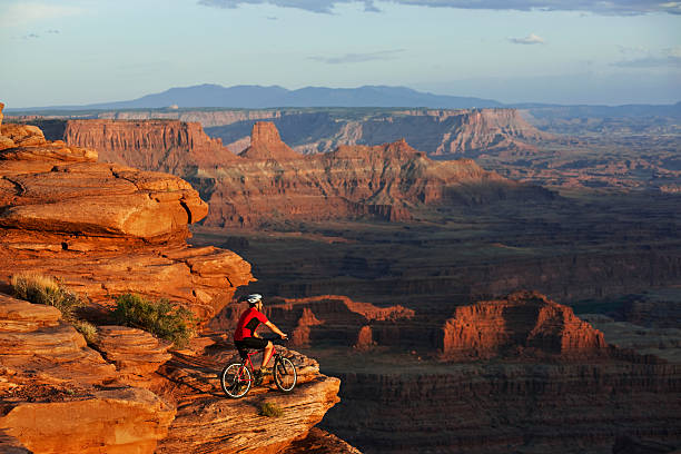istock Male Mountainbiker Stopped To Enjoy Panoramic View In Canyonlands 118266493