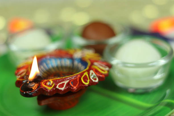 istock Deepawali Deepavali Diwali Celebrations with Diya and Sweets with Selected Focus on Diya 1182666928