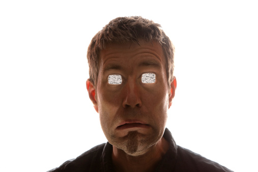 Portrait shot of man with square television eyes. White background.