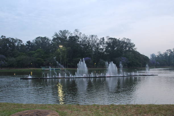 istock water fountain in artificial lake 1182669713