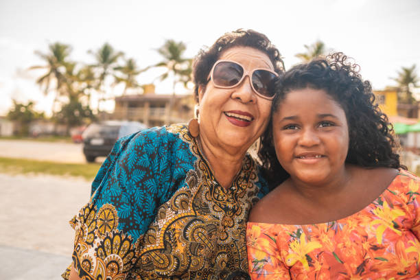 Portrait of grandmother with her granddaughter Grandmother, Granddaughter, Family, Cute, Care hispanic grandmother stock pictures, royalty-free photos & images