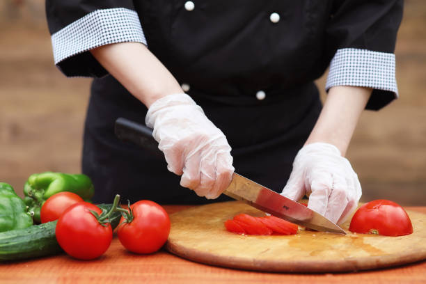 istock The cook cuts fresh farm vegetables 1182671208
