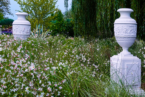 Meadow with 2 white vases