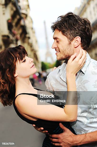 Young Couple Lovers In Paris France With Eiffel Tower Stock Photo - Download Image Now