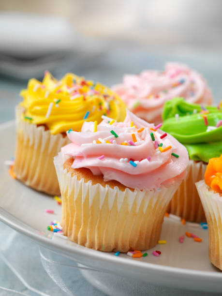 istock Colorful Cupcakes with Candy Sprinkles 1182675420